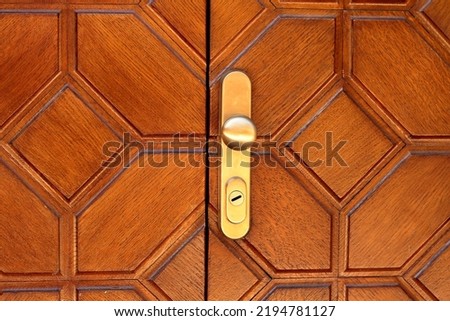 Wooden brown door with metal handles no people stock photo