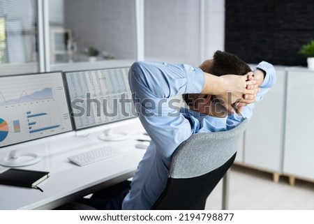 Advisor Man Relaxing In Office Chair At Desk