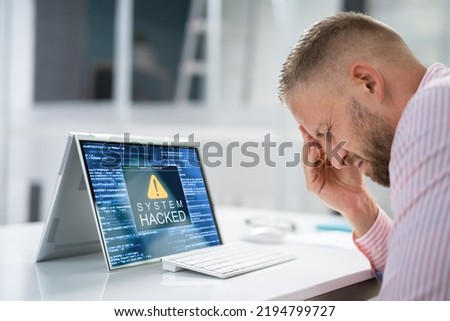 Ransomware Malware Attack. Business Computer Hacked. Security Breach Royalty-Free Stock Photo #2194799727