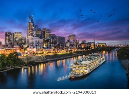 Nashville skyline with river and sunset