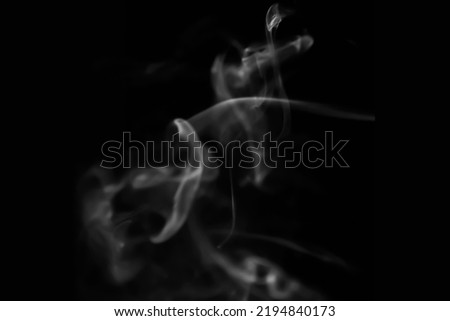 white abstract Smoke, steam, puffs over black background  Royalty-Free Stock Photo #2194840173