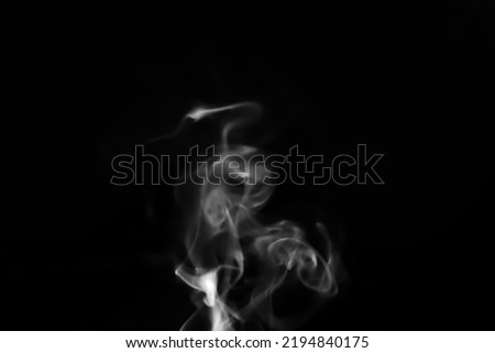 white abstract Smoke, steam, puffs over black background 