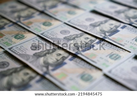 US one hundred dollars bills money line pattern, close up Royalty-Free Stock Photo #2194845475