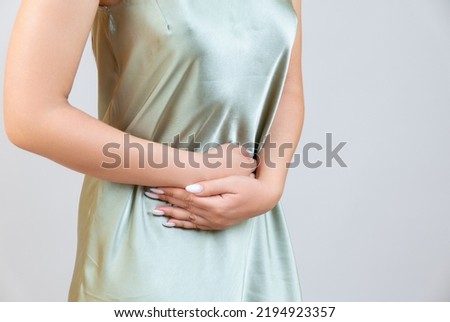 Menstrual pain, woman with stomachache suffering from pms , endometriosis, cystitis and other diseases of the urinary system