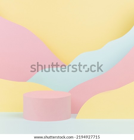 Trendy hipster scene - pink circle podium mockup, abstract mountain landscape - pastel pink, yellow, mint color, square. Vapor wave template stage for advertising, presentation of cosmetic, goods.