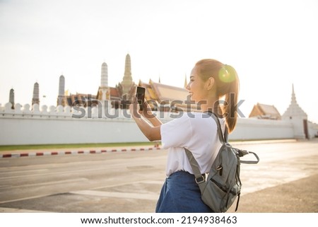 Asian female backpacker travel in bangkok