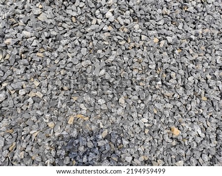 Crushed stone textured background for use