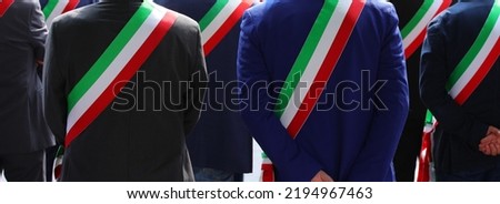many Italian mayors with the tricolor sash during the commemoration Royalty-Free Stock Photo #2194967463