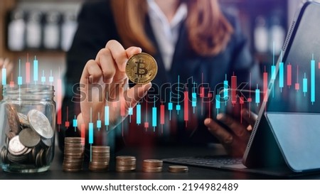 Businesswoman holding bitcoin on cyberspace background bit coin BTC the new virtual money.man's hand holding golden Bitcoin.
