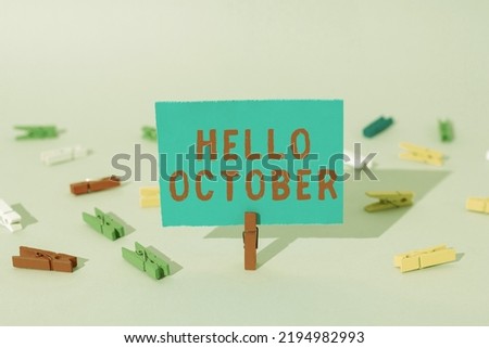 Text caption presenting Hello October. Business showcase Last Quarter Tenth Month 30days Season Greeting Important Message Presented On Piece Of Paper Clipped With Clip.