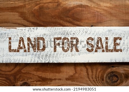 Inspiration showing sign Land For Sale. Concept meaning Real Estate Lot Selling Developers Realtors Investment Important Informations Written On Piece Of Wood On Floor.