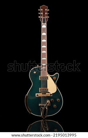 beautiful electric guitar on a black background, with reflection, custom