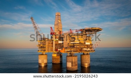 Offshore gas production platform. A large structure in the sea against a clear sky. The platform produces hydrocarbons. Royalty-Free Stock Photo #2195026243