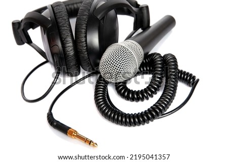 Headphone and microphone isolated on white background . Musical concept.
