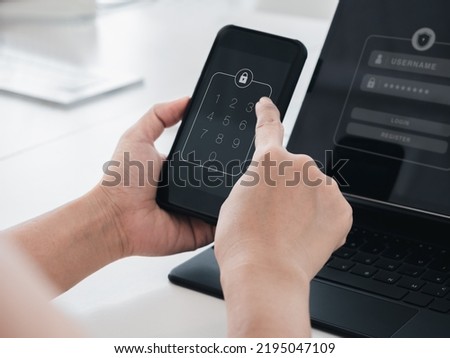 Two steps authentication or 2FA concept. Numbers passcode, lock code icon on smart mobile phone screen in hand with laptop for validate password page, Identity verification, cyber security technology. Royalty-Free Stock Photo #2195047109