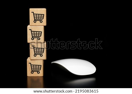 white mouse with wooden cube shopping cart icon, online shopping. on a dark background.	             