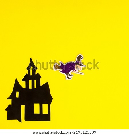 Creepy horor house and witch on yellow background. Creative copy space holidays background