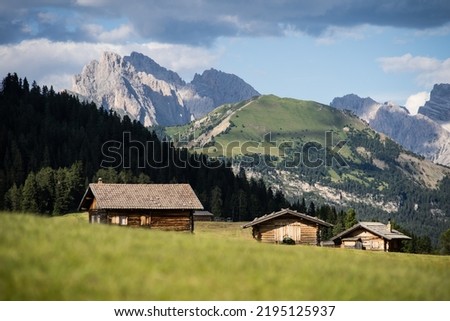 A different perspective of the many mountain huts that are scattered across the hills of Seiser Alm, Northern Italy