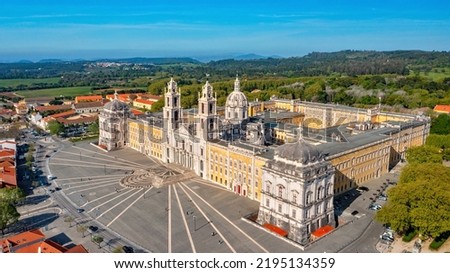 Aerial view of the Palace of Mafra. Unesco world heritage in Portugal. Aerial top view of the Royal Convent and Palace of Mafra, baroque and neoclassical palace. Drone view of a historic castle. Royalty-Free Stock Photo #2195134359