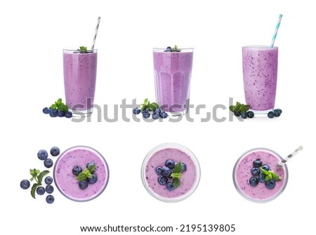 Set with glasses of blueberry smoothie, fresh berries and mint on white background Royalty-Free Stock Photo #2195139805