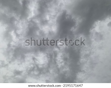 Big gray stratocumulus clouds it creates a layer of clouds up into the sky at Thailand.no focus