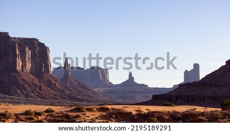 Desert Rocky Mountain American Landscape. Morning Sunny Sunrise Sky. Oljato-Monument Valley, Utah, United States. Nature Background Royalty-Free Stock Photo #2195189291