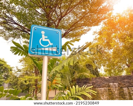 Wheelchair sign in the park early morning atmosphere