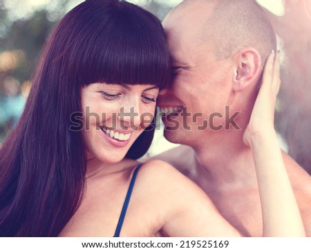 Young happy smiling couple in love
