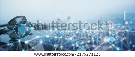 Telemedicine, internet medical network connection, online medical, global health concept. Stethoscope and laptop computer on the city background with internet health network connection technology Royalty-Free Stock Photo #2195271123