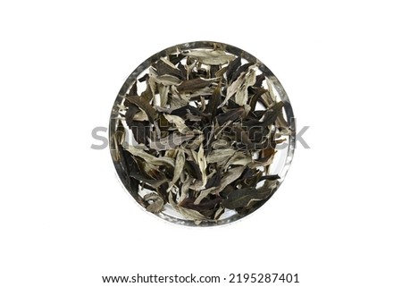 Organic White Tea on white background. whole leaf. Top view. Close up. High resolution stock photos. 