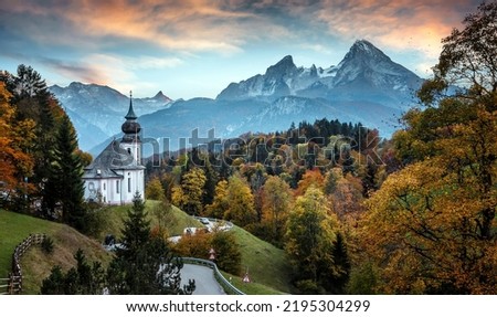 Beautiful nature landscape. Incredible autumn scenery. View on Alpine highlands with Watzmann mountduring sunset. Famous Maria Gern Church. Berchtesgaden Bavaria Alps Germany Royalty-Free Stock Photo #2195304299