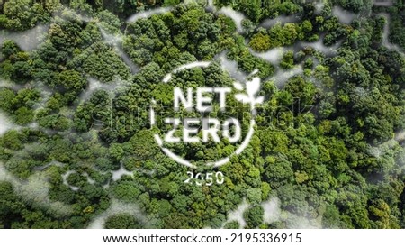 Net Zero 2050 Carbon Neutral and Net Zero Concept natural environment A climate-neutral long-term strategy greenhouse gas emissions targets A cloud of mist in the green Net Zero figure. Royalty-Free Stock Photo #2195336915