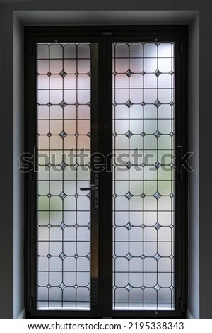 Vintage glass front door, view from the inside of the room