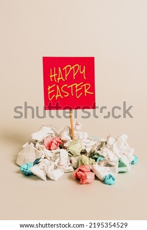 Conceptual display Happy Easter. Internet Concept Christian feast commemorating the resurrection of Jesus Paper Wraps Around Important Information Pinned On Piece Of Wood.