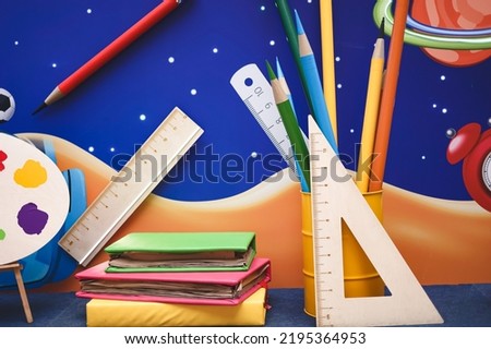 Back to school concept. Colorful, bright, school background with various school supplies. 