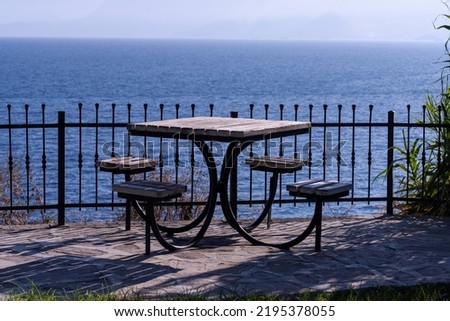 Picnic table located on the cliffs to watch the sea