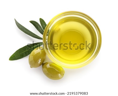 Bowl of fresh olive oil isolated on white background