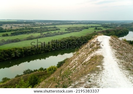 Mid summer landscape of chalk mountins and hills at Don River valley, Storozhevoe, Voronezh region, Russia Royalty-Free Stock Photo #2195383337