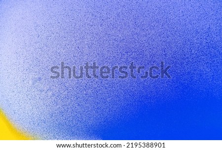 Beautiful bright colorful street art graffiti background. Abstract creative spray drawing fashion colors on the walls of the city. Urban Culture gradient texture, copyspace backdrop Royalty-Free Stock Photo #2195388901