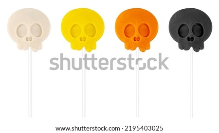 Halloween themed skull candy isolated on white background. skullcandy multicolored.
