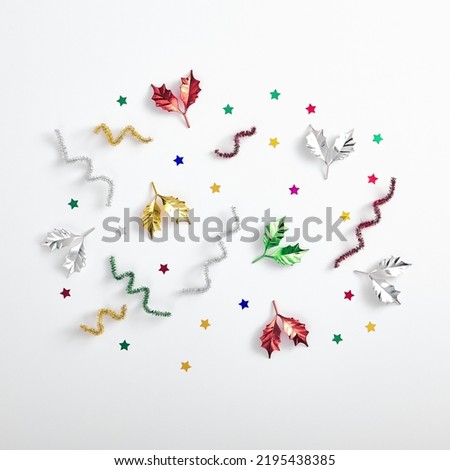 Tinsel in abstract style on white background. Party pattern with glitter, stars and tinsel. Frame filled party elements. Tinsel for christmas party. Xmas pattern on white background