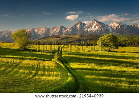 Spring view of the Tatra Mountains in Poland from Spisz and Podhale. Beautiful views from one of the most beautiful places in Małopolska. Royalty-Free Stock Photo #2195440939