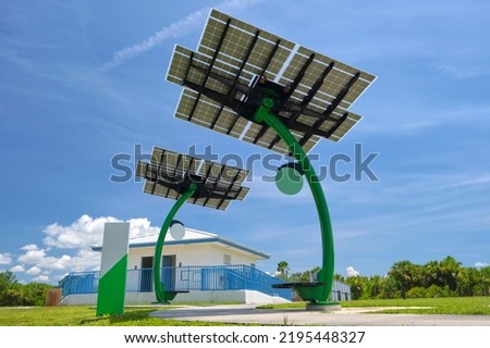 Solar photovoltaic panels mounted on city street pole for electricity supply of streetlights and surveillance cameras