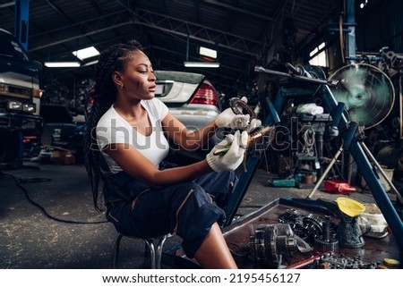 Auto mechanic are repair mechanical part and maintenance auto engine is problems at car repair shop.