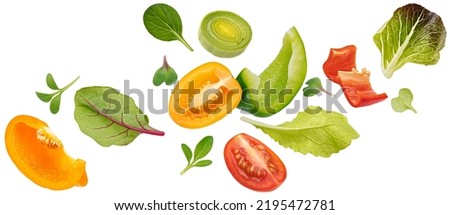 Falling vegetables, salad of bell pepper, tomato and lettuce leaves Royalty-Free Stock Photo #2195472781