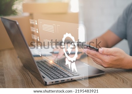 Customer rating to service experience and Warranty for parcel delivery online application ,A man checking the satisfaction of the customers with the parcel delivery service in smartphone in office Royalty-Free Stock Photo #2195483921