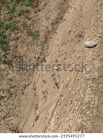 Sand and gravel on walking path