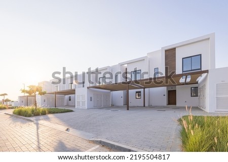 Modern homes and Town houses. Royalty-Free Stock Photo #2195504817