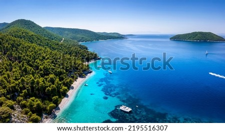 Aerial view of the beautiful coast of Skopelos island with turquoise sea at pristine beaches and thick pine forest, Sporades, Greece Royalty-Free Stock Photo #2195516307