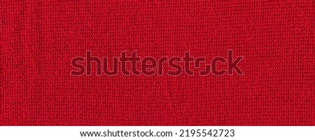 Pattern fabric made of wool. Handmade knitted fabric red wool background texture Royalty-Free Stock Photo #2195542723